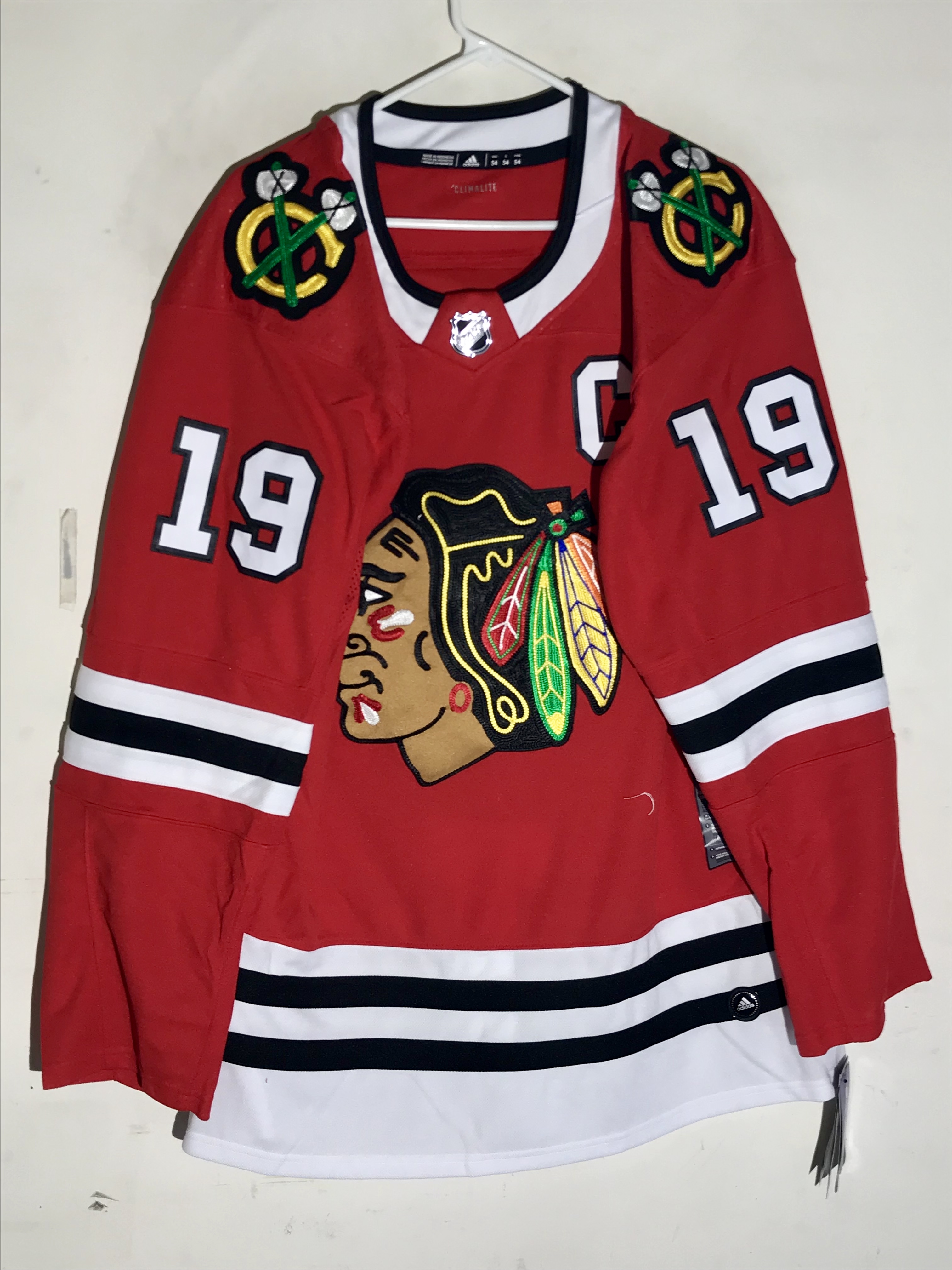 what color is the blackhawks home jersey